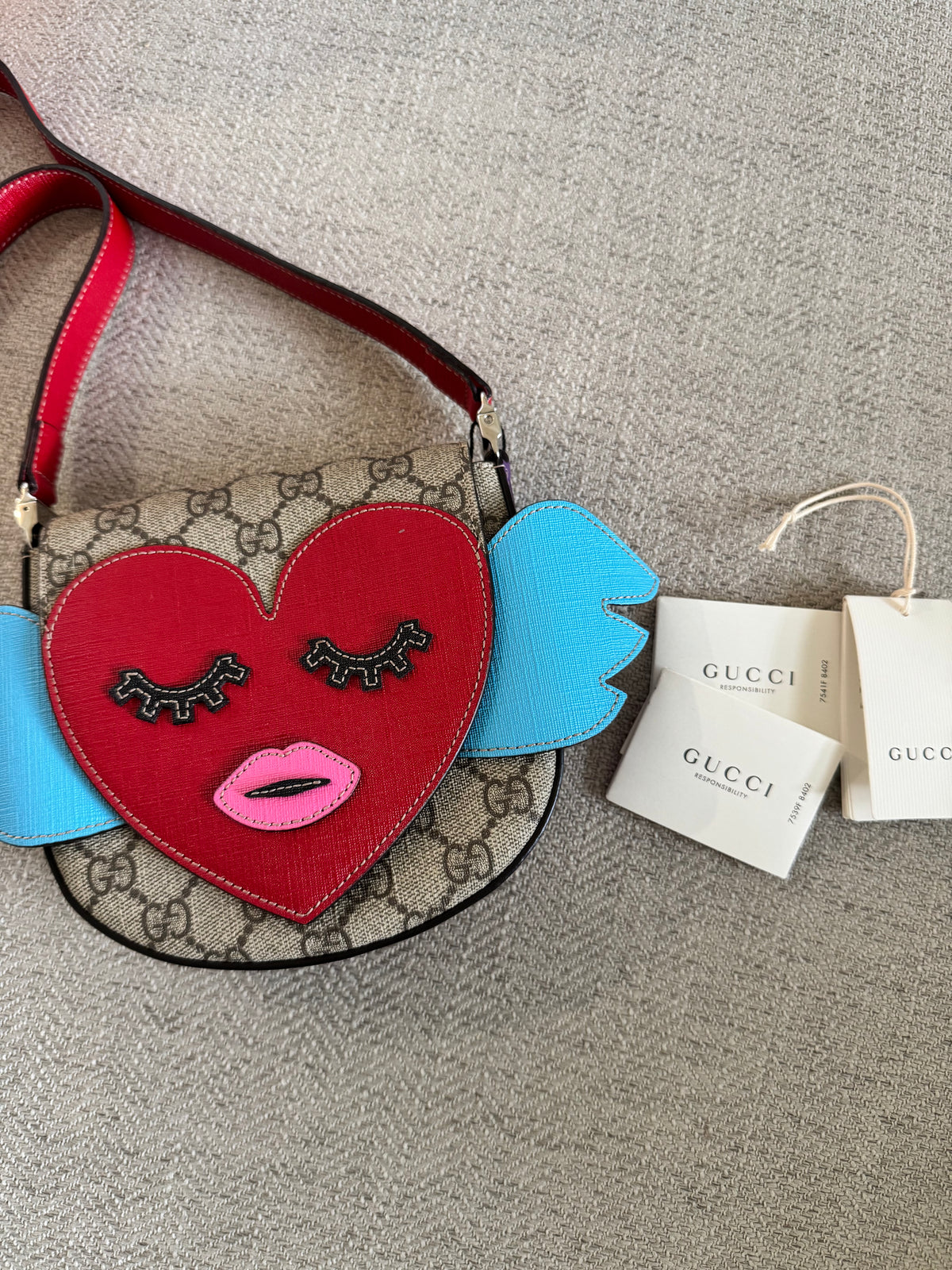 Gucci Supreme Winged Heart Bag