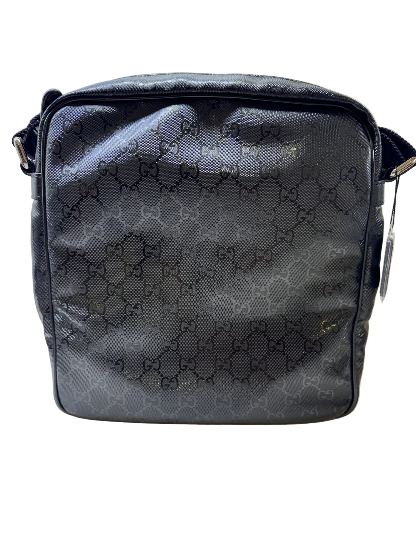 Gucci GG Imprime messenger bag in black, featuring a coated canvas body with tonal monogram detailing and adjustable strap
