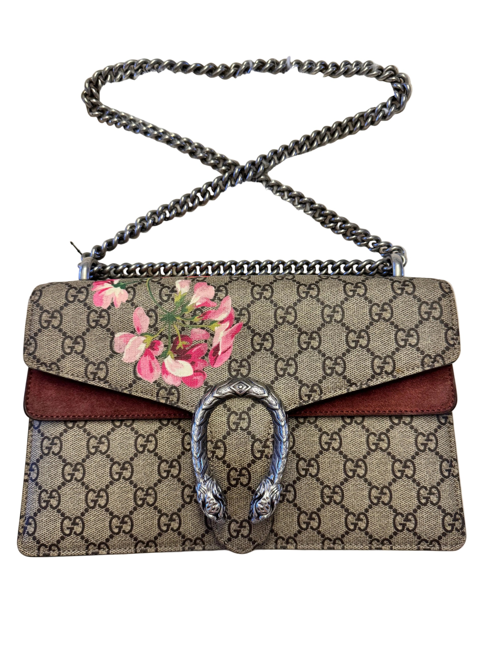 Gucci GG Supreme Dionysus shoulder bag featuring a Blooms print and a distinctive silver-tone tiger head clasp.