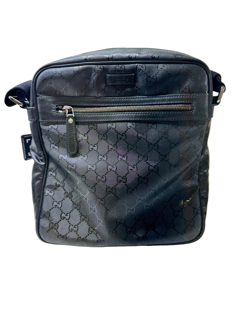 Gucci GG Imprime messenger bag in black, featuring a coated canvas body with tonal monogram detailing and adjustable strap