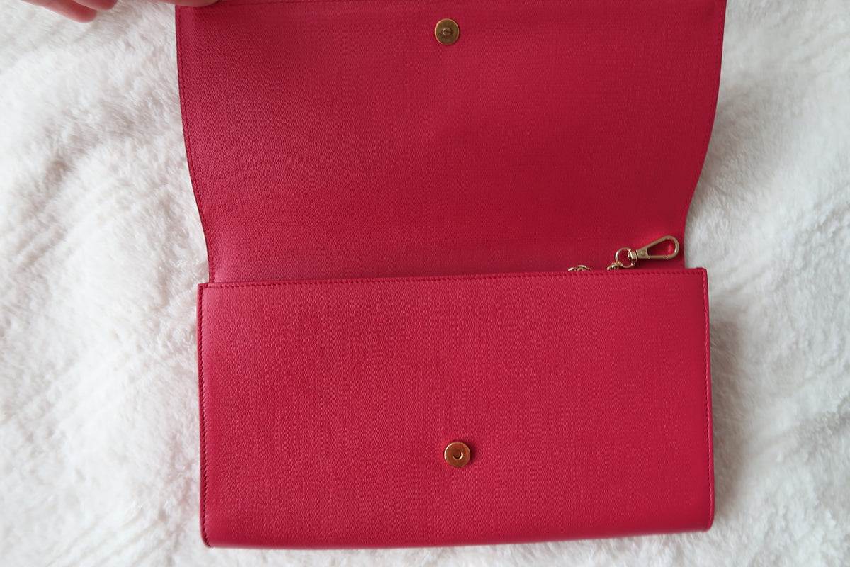 YSL Saint Laurent pink clutch