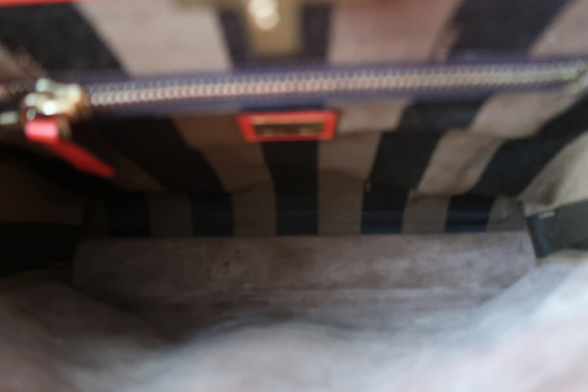 Fendi Medium Peekaboo Bag – Orange Leather with Pequin Stripe Interior